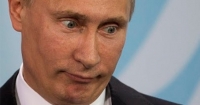 путін