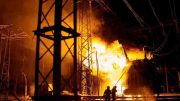 Firefighters battle flames after a Russian rocket attack hit an electric power station in Kharkiv